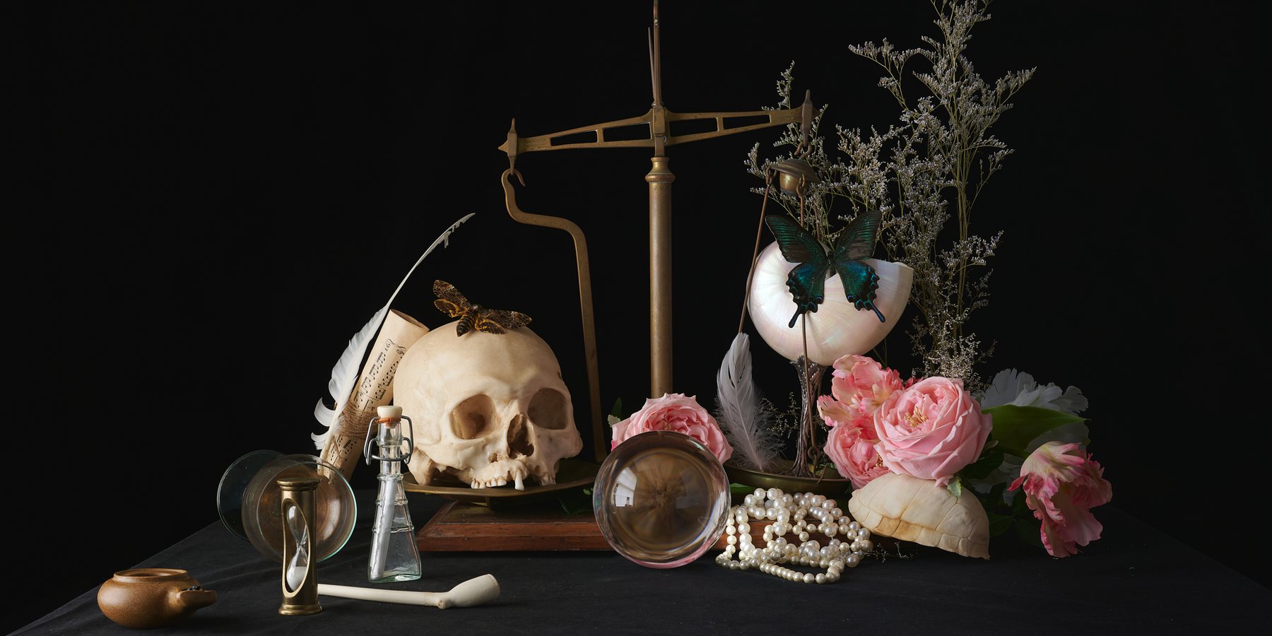 Adam Gedney, The Moth and the Butterfly: a skull and death's-head moth on one pan of a brass balance, a nautilus shell with a blue butterfly and roses on the other